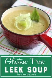 Pinterest graphic with bowl of leek soup topped with fresh leek rings. 