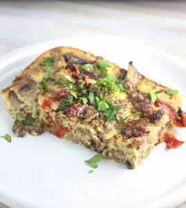 Breakfast casserole on white plate
