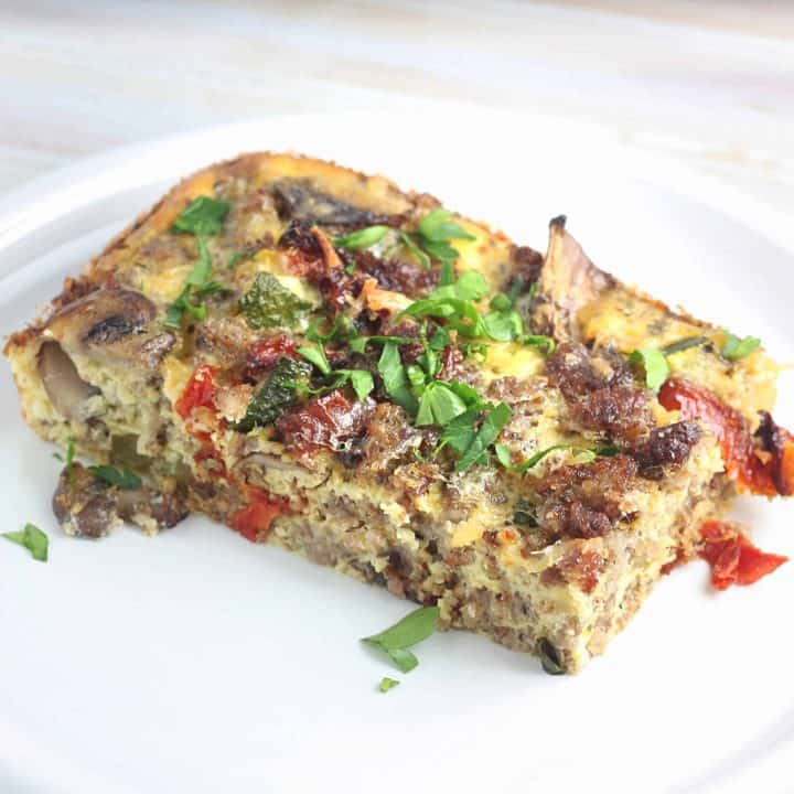 Breakfast casserole on white plate