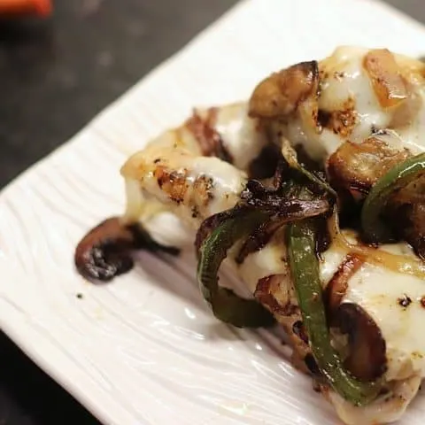 Grilled chicken with sauteed peppers, mushrooms, and onions covered with Provolone cheese