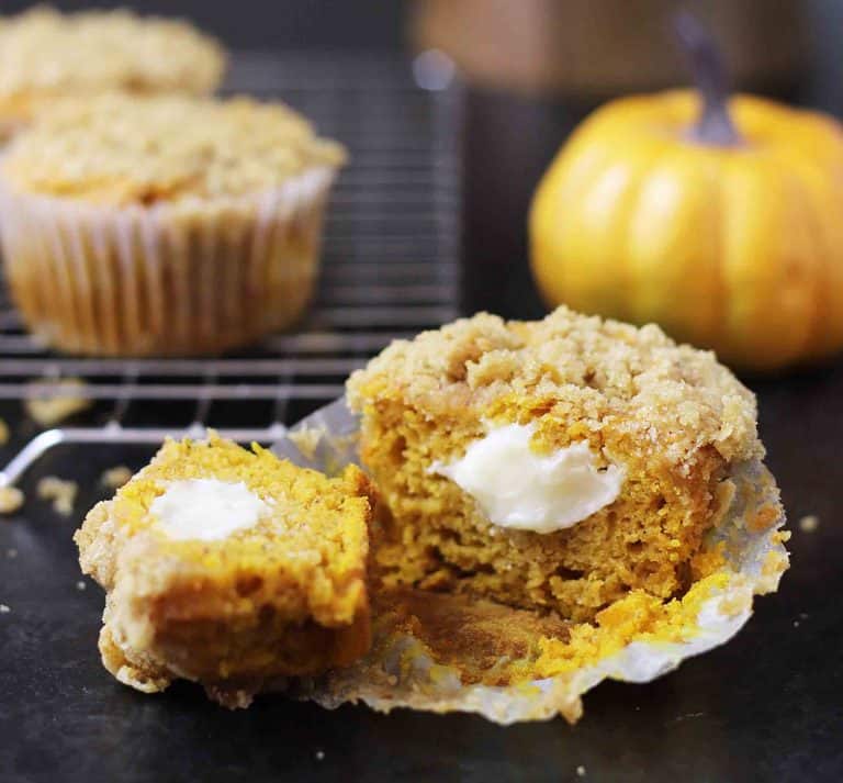 Gluten Free Pumpkin Cream cheese muffin cut in half