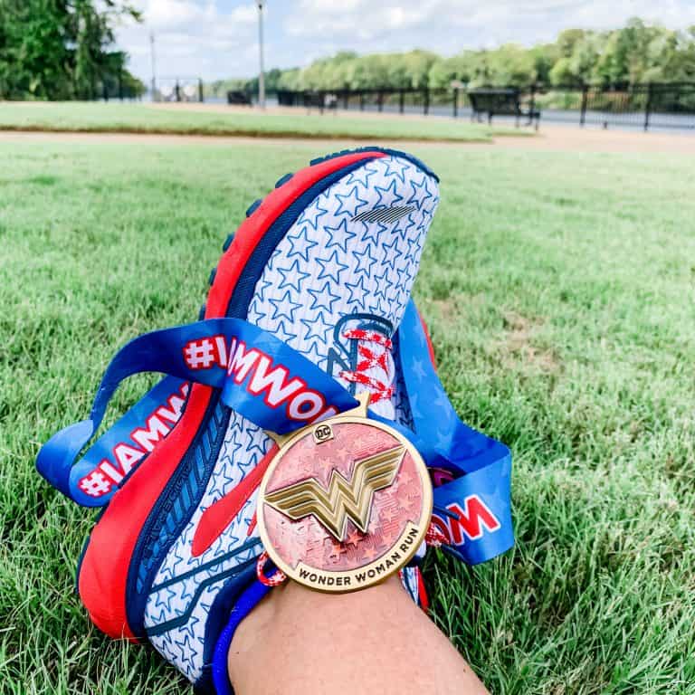 Running shoe with medal